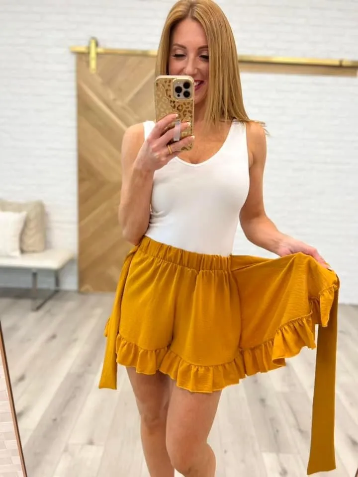Center Stage Ruffle Hem Skort in Golden Mustard